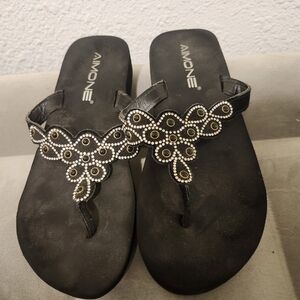 Elegant Black Floral Sandals with Metallic Accents